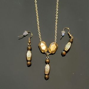 Brown and gold earrings and necklace